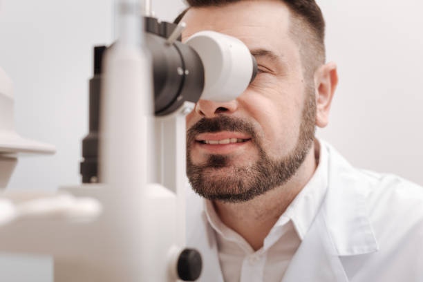 istock Delighted professional oculist enjoying his job 666887786