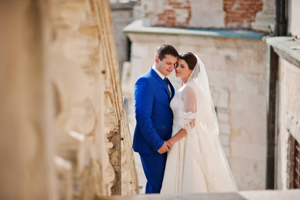 istock Young wedding couple on background old castle 666890534