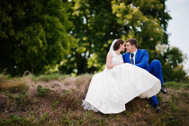 istock Young wedding couple on background old castle 666890636