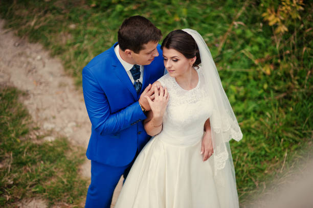 istock Young wedding couple on background old castle 666890736