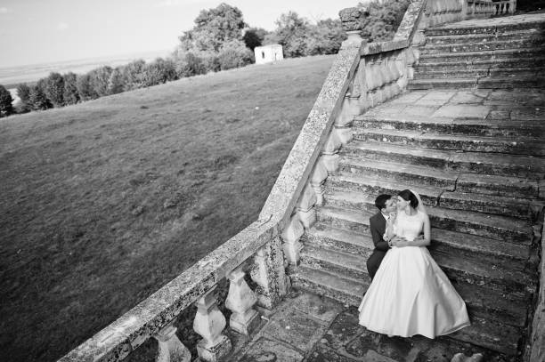 istock Young wedding couple on background old castle 666890824
