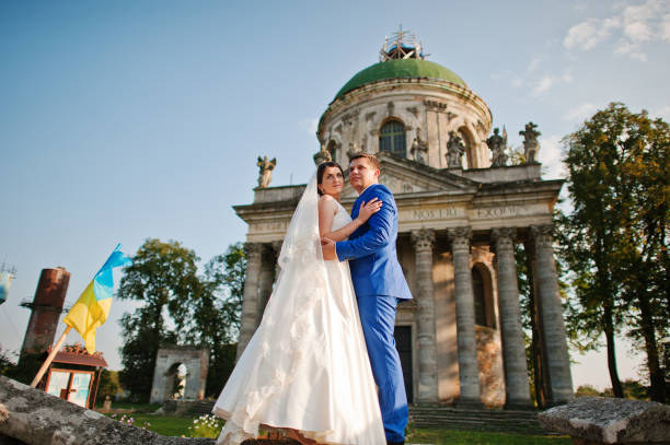 istock Young wedding couple on background old castle 666891010