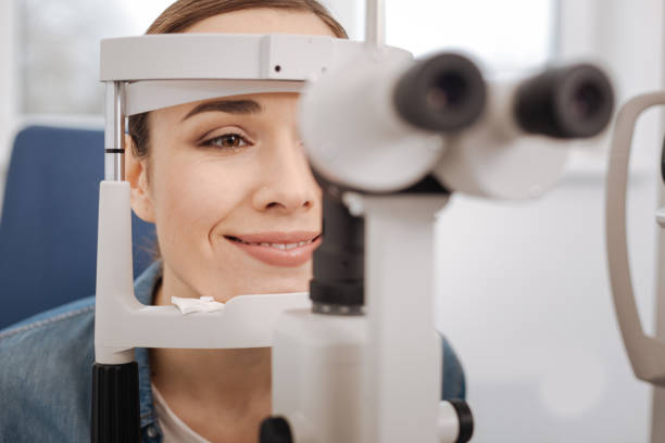 istock Happy beautiful woman visiting an optometrist 666898436