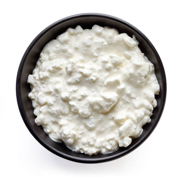 istock Bowl of cottage cheese from above 666899094