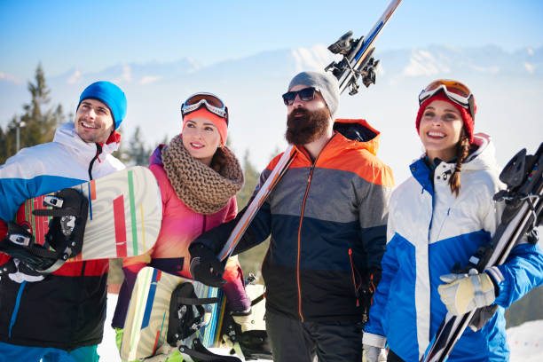 istock Front view of young snowboarders team 666901456