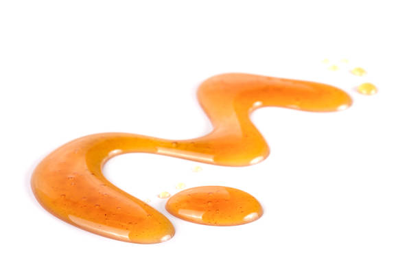 istock Honey stain isolated on a white background 666901688