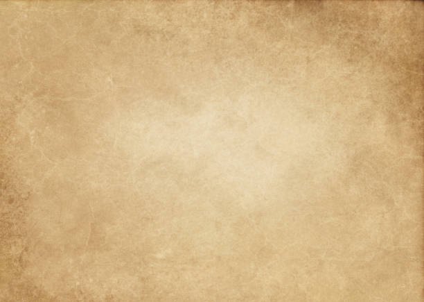 istock Old yellowed and stained paper texture. 666902154