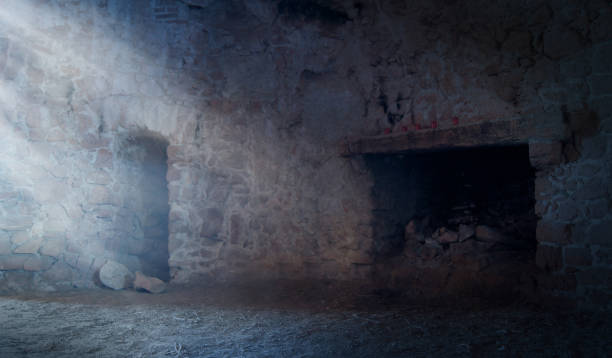 istock Light is shining in a stone wall room with fireplace 666903184
