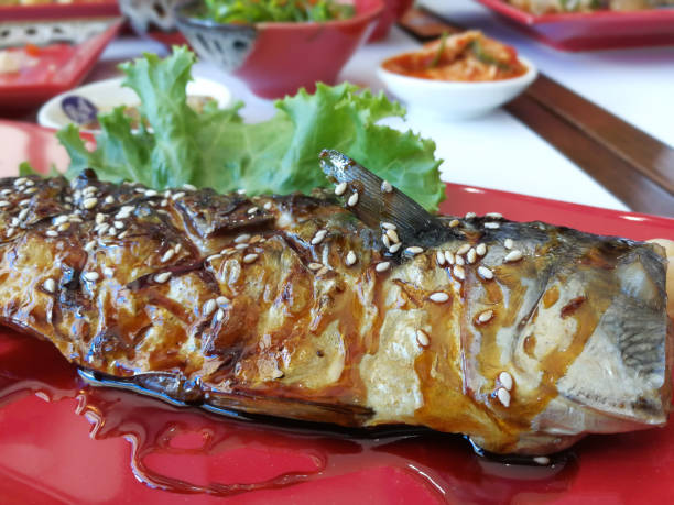 istock japanese cuisine, fried fish on background 666905054