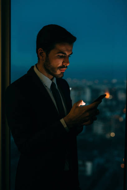 istock Buisnessman Texting On The Phone 666915486