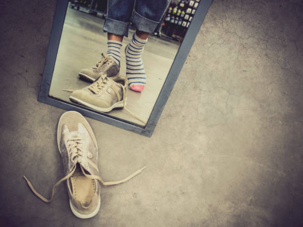 Woman trying on sneakers