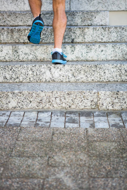 istock Athlete jogging up the stairs 666919926