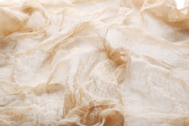 istock Beige gauze fabric background 666920512