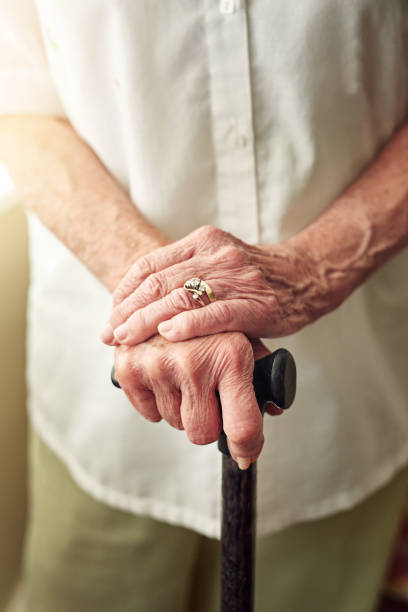 istock Moving around with a little help from her cane 666923252