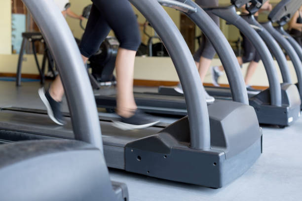 istock Women running on tread mill 666929900