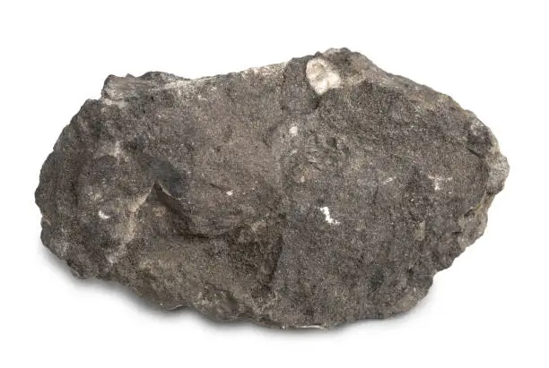 Mineral stone  phosphorite or rock phosphate isolated on white background. Phosphorite contain high amounts of phosphate bearing minerals.