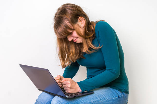 istock Woman is suffering from back pain - bad posture concept 666943068