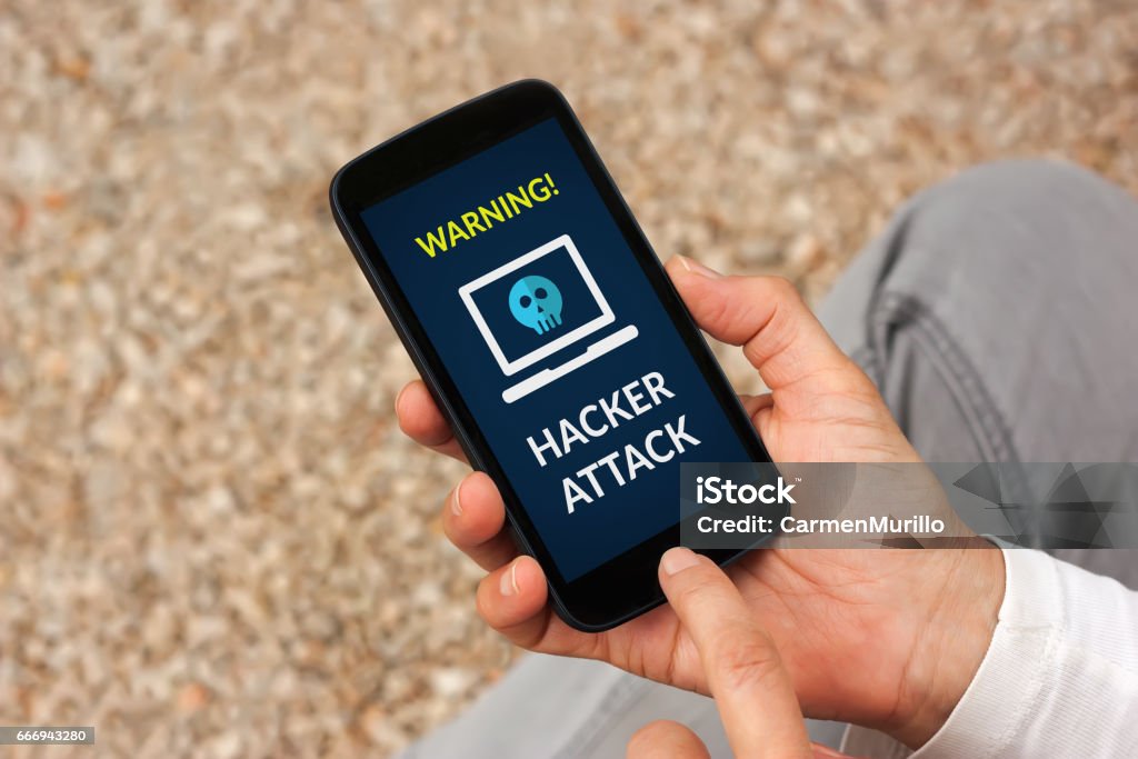 Phone Attacking Hand Hands Holding Smart Phone With Hacker Attack Concept On Screen Stock ...