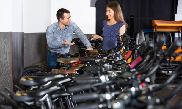 istock guy and girl hiring bikes 666943304