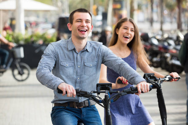 istock Young couple with electric bikes 666943330