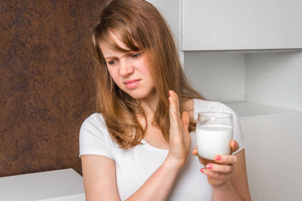 istock Woman with lactose problem is suffering from stomach pain 666946984