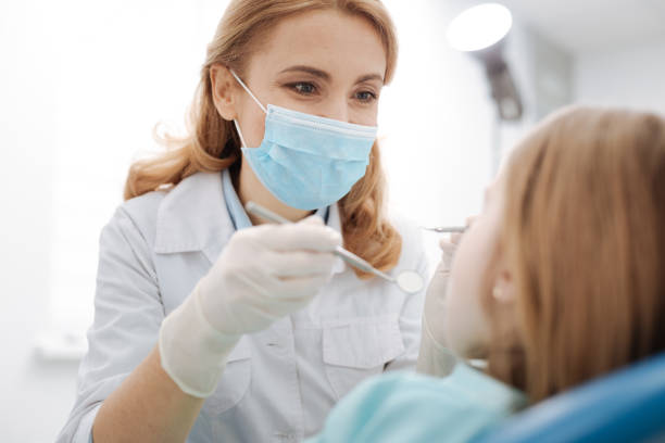 istock Sweet lovely doctor doing a routine checkup 666947400