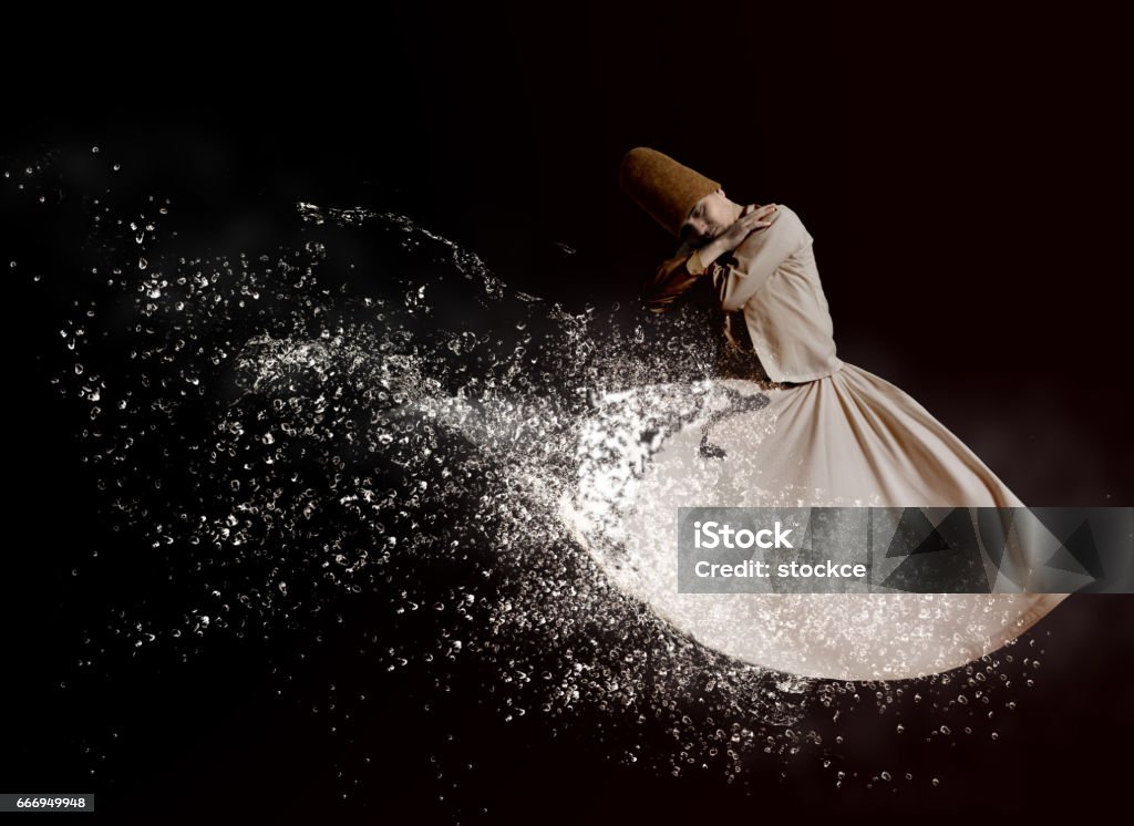 Dervish Dervish spinning in white from above on black background Sufism Stock Photo