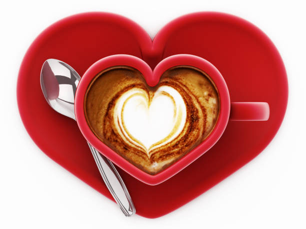 Heart shaped red coffee cup full of cappuccino or expresso isolated on white.