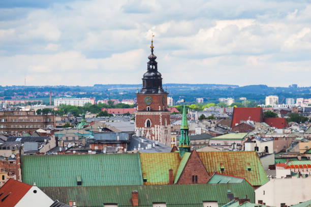 istock Gothic town hall tower with clock in Cracow, Poland. Aerial view 666950554