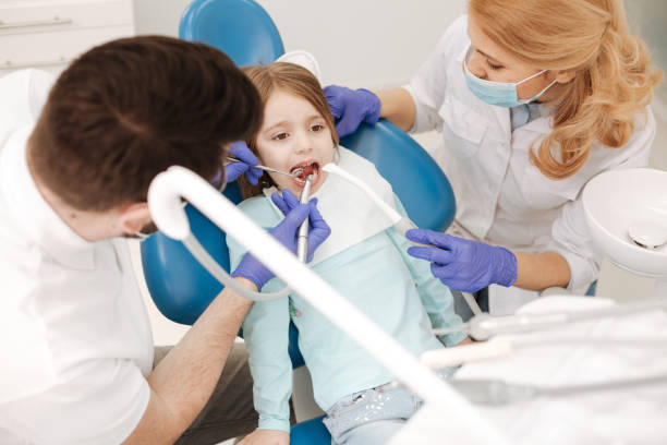 istock Brave ginger child having her tooth filled 666951120