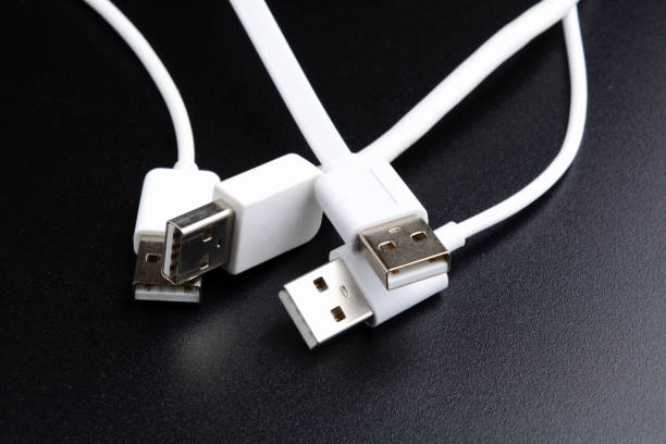 istock white usb cable on black background minimal picture 666954266