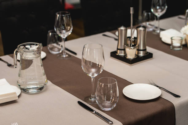 istock View of the served table in a restaurant. beige brown tones 666964314