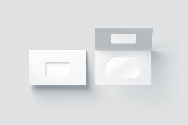 istock Blank white plastic card mockup inside paper booklet holder 666964422