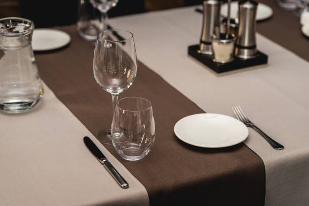 istock View of the served table in a restaurant. beige brown tones 666964464