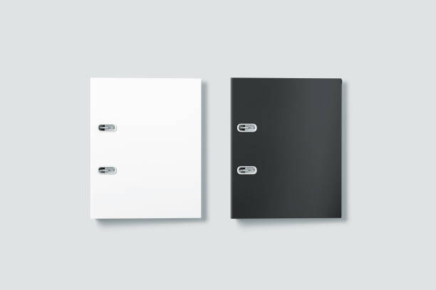 istock Blank black and white ring binder folder cover mockup top view 666964614