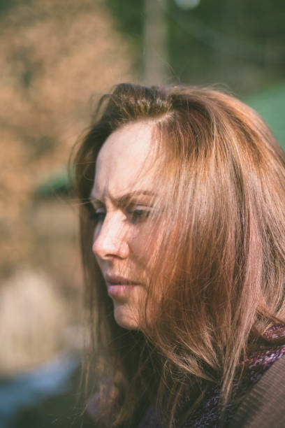 istock Young woman is walking in a forest 666968112