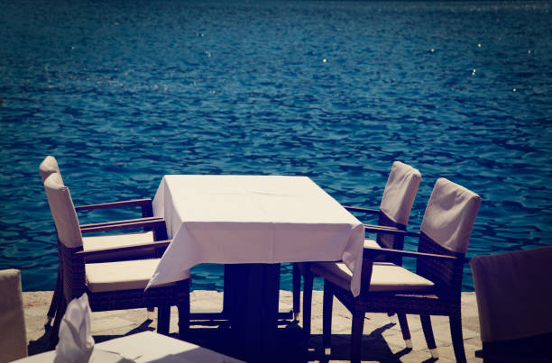 istock Scenic cafe table with sea view 666971750
