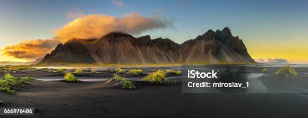 Sunset Above Vestrahorn And Its Black Sand Beach In Iceland Stock Photo - Download Image Now