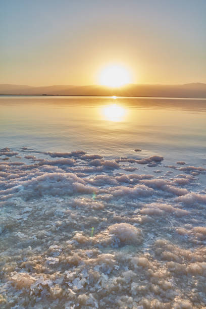 istock Dead sea salty water and sunrise 666981036