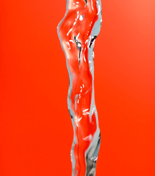istock a jet of water on a red background 666991604