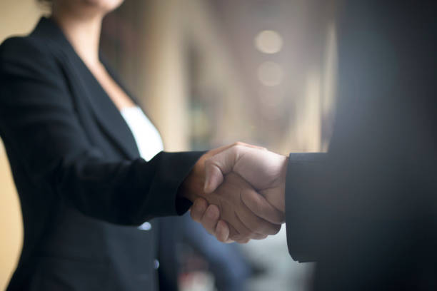 Handshake Two people shaking hands on business event. business relationship stock pictures, royalty-free photos & images