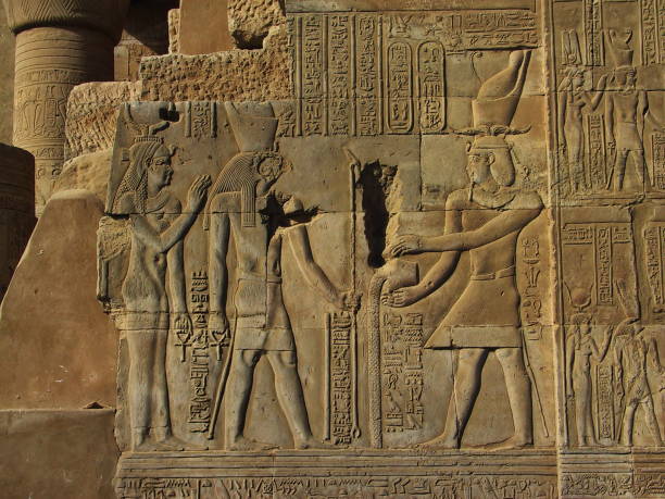 istock Egypt. Kom Ombo. Pharaoh in front of Haroeris and Hathor. 666992212