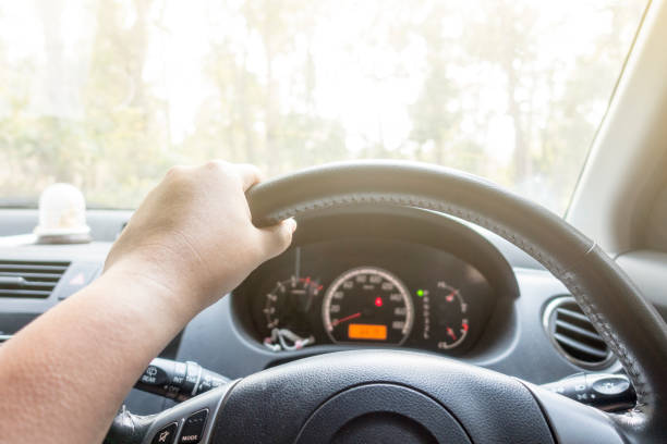 istock young man driving car 666999104