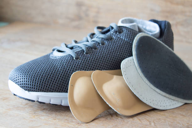 istock Gray running shoes with orthopedic insoles 667013520