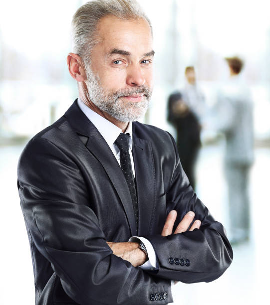 istock Happy smart business man with team mates discussing the background 667016446