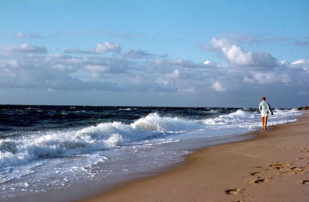 Sylt, Schleswig Holstein, Germany, 1956. Strollers on the beach of Sylt.