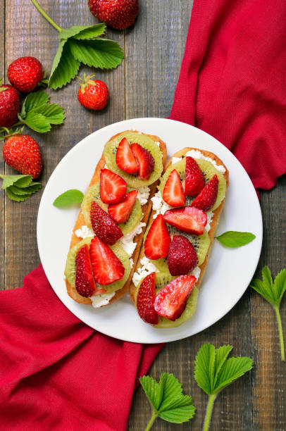 istock Bruschetta with strawberries and kiwi 667028062