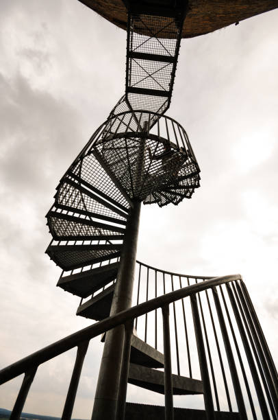 istock Spiral staircase in the sky 667039234