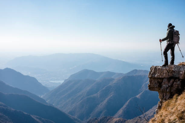 Climber watches a mountain valley