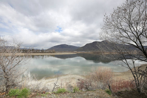 istock Overcast Sky above Thompson River, Kamloops, British Columbia 667055546